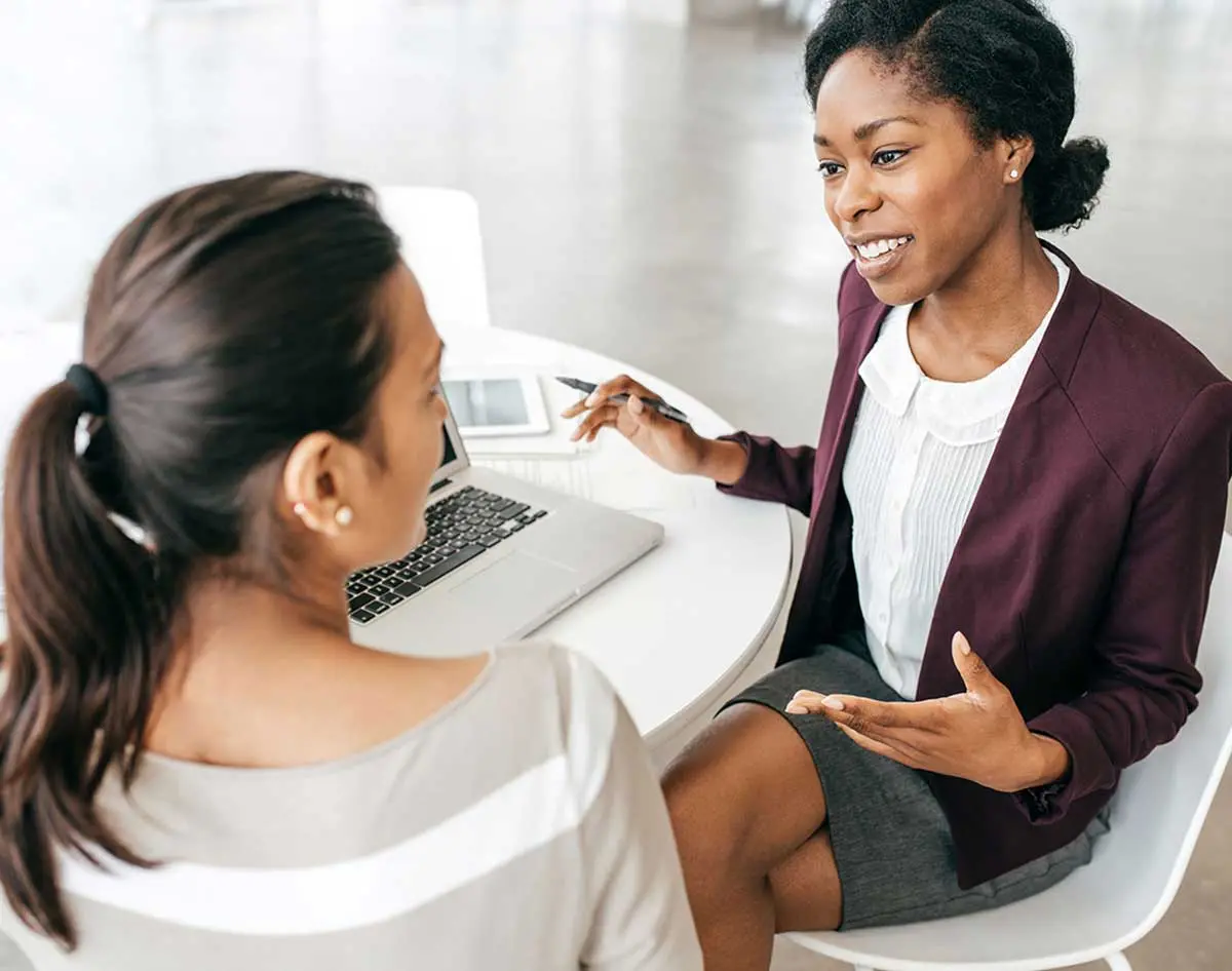 Two office colleagues in a meeting