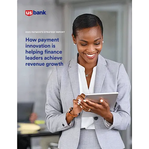 Business woman looking at payments information on her tablet