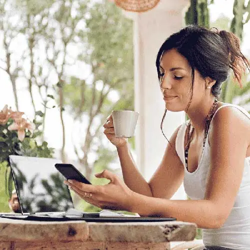 Person viewing debit card transactions on a phone