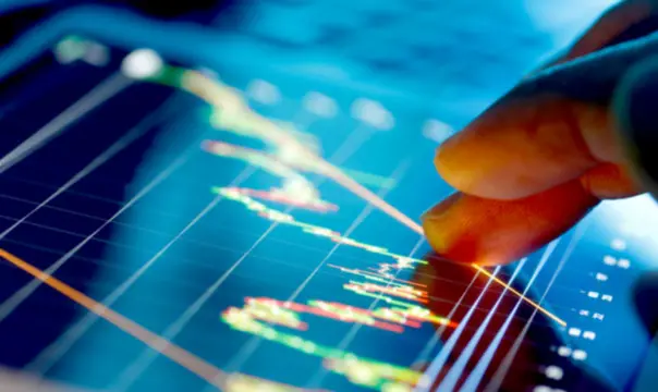 Close-up of finger moving on a tablet.