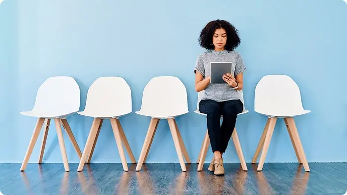 Woman waiting in a chair