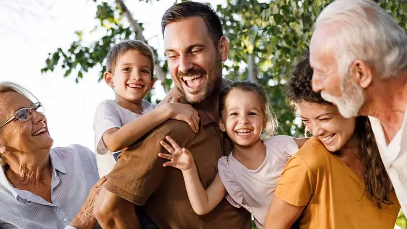 multi-generational family smiling