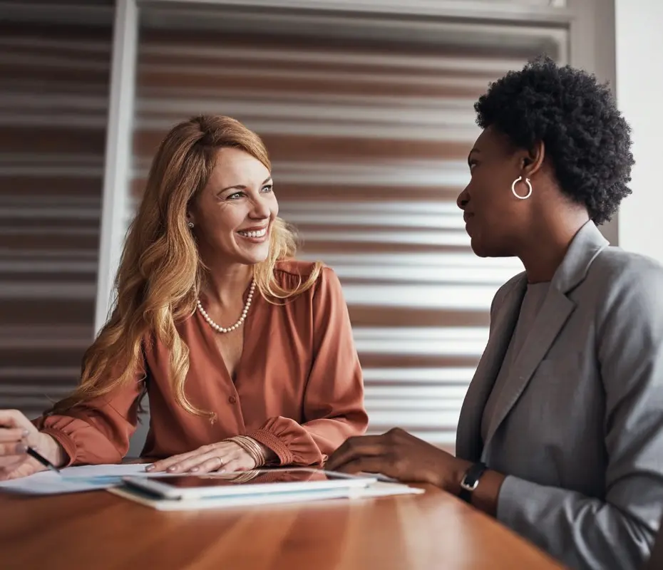 Photo of two people meeting